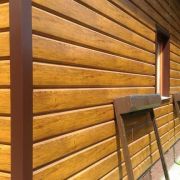 Сайдинг металлический золотой дуб текстура 0,5 мм L-брус ширина 240 мм ECOSTEEL